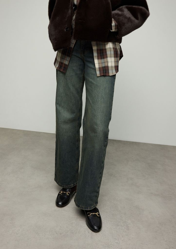 Sacha Zwarte Leren Slip On Loafers Met Goudkleurige Chain