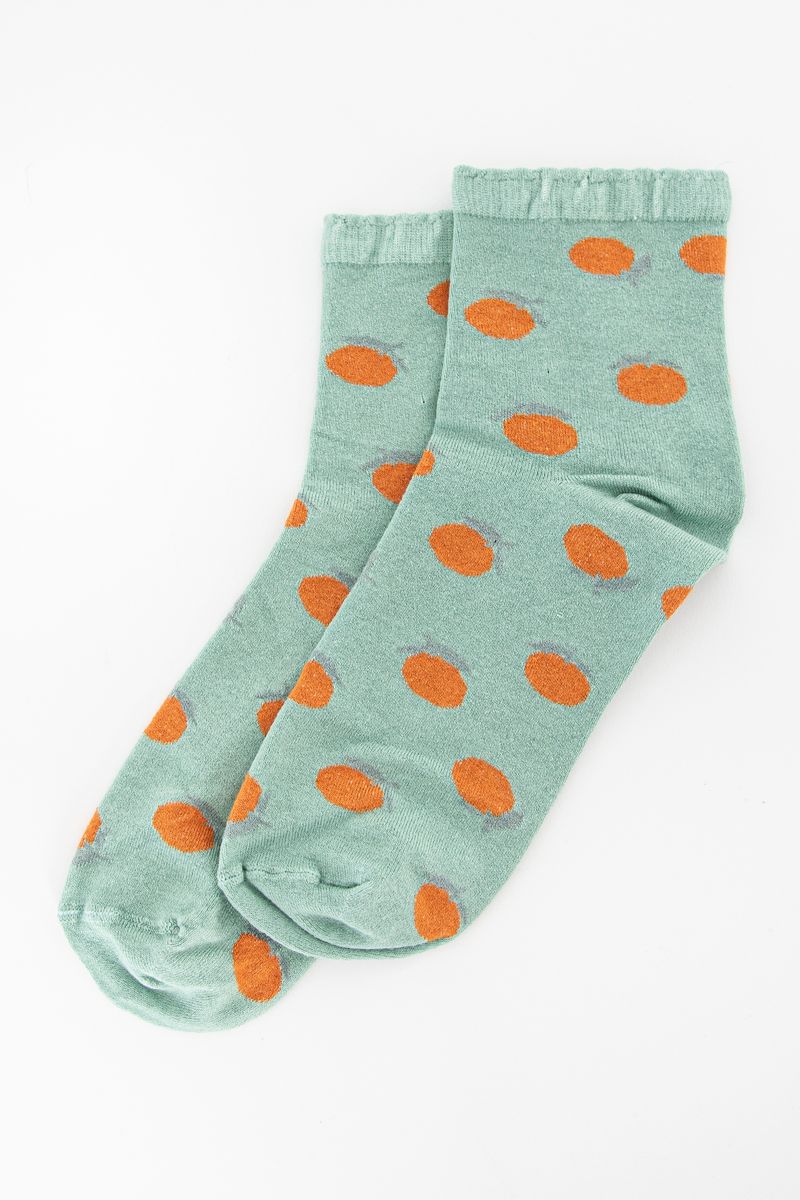 Blauwe sokken met sinaasappels