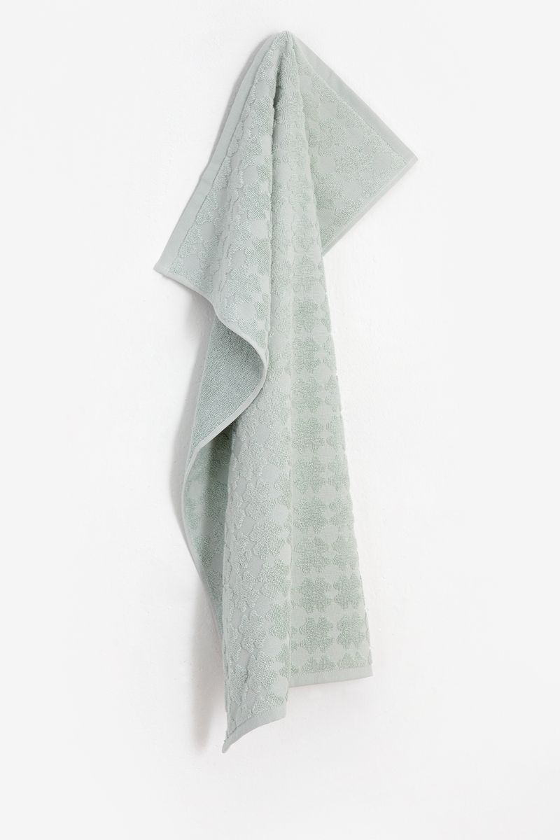 Grijze handdoek klavertje vier