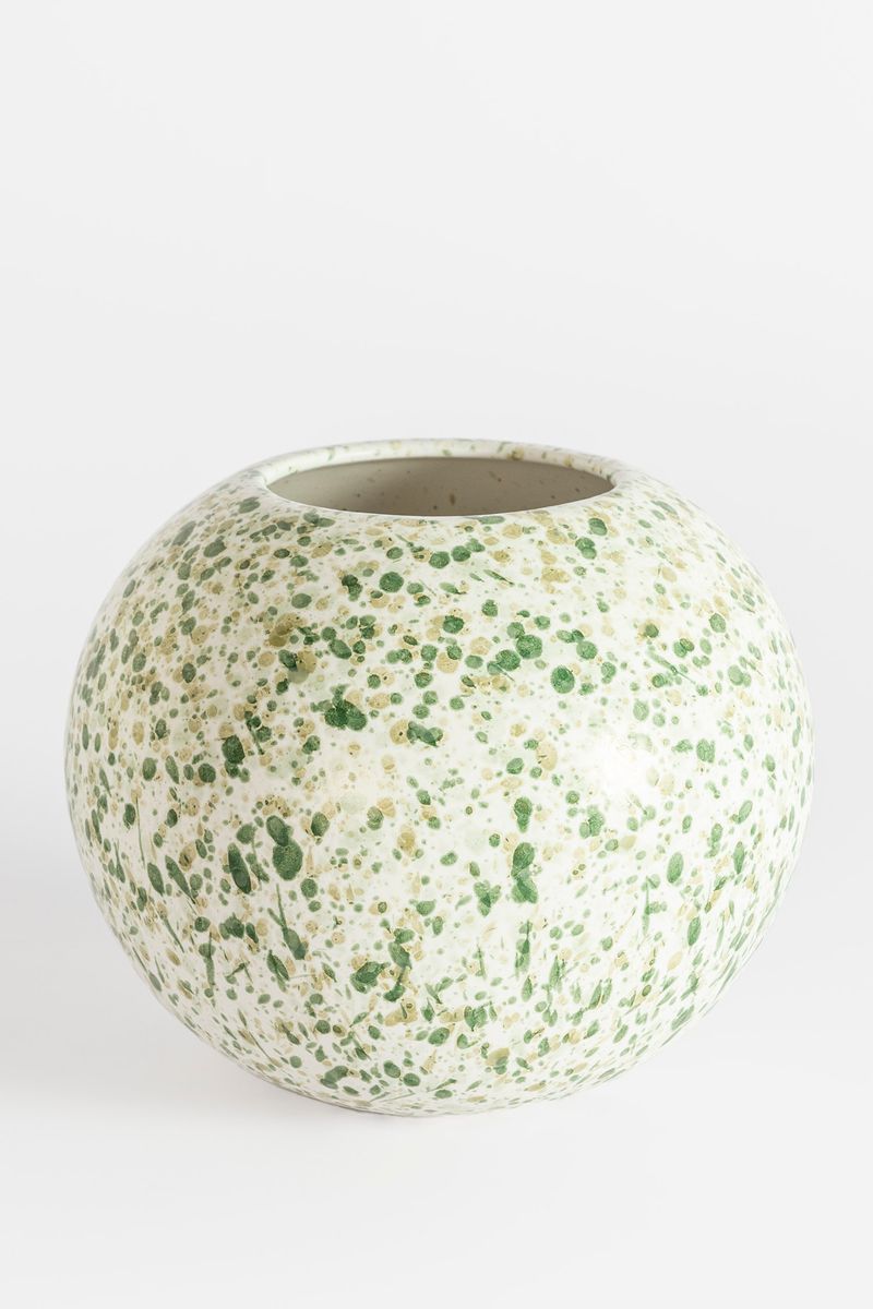 Witte ronde vaas met groene gevlekte print