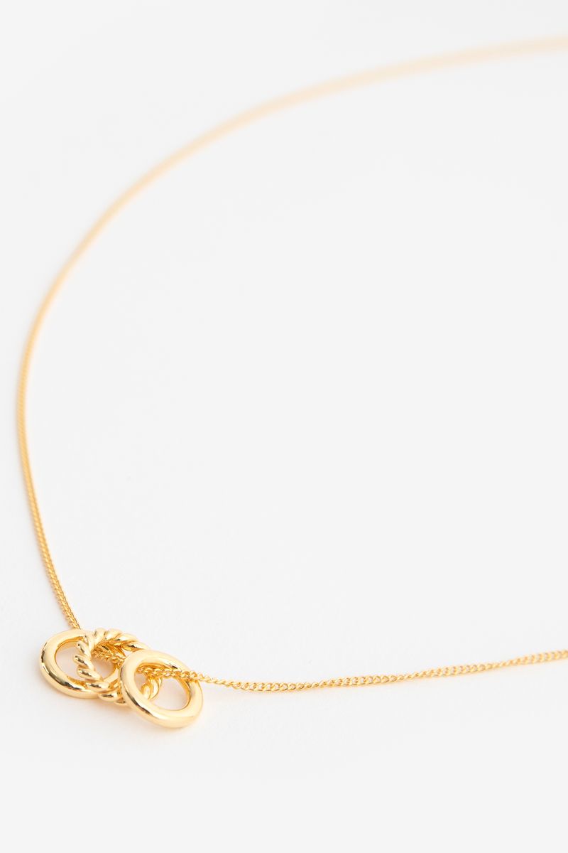 A Brend gold plated ketting met ronde hangertjes