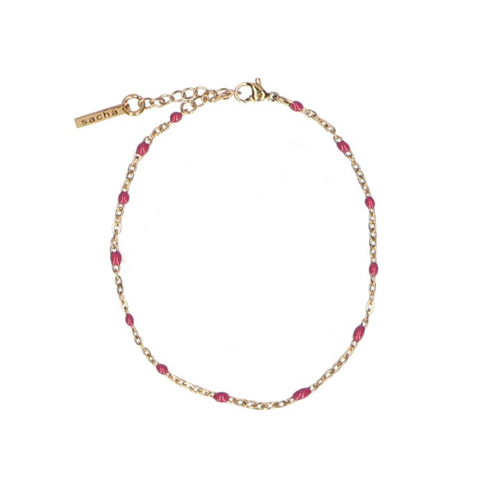 Goudkleurige armband met roze kraaltjes