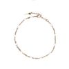 Goldenes Armband mit weißen Perlen