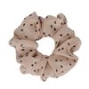 Rosafarbener Scrunchie mit Punkten