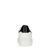 Witte sneakers met lak detail