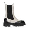 Latte chelsea boots met zwarte details