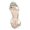 Goudkleurige sandalen met hak