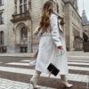 Bottes hautes en cuir avec petit talon - blanc cassé