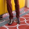 Boots mit Schlangenmuster