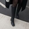Schwarze Lederstiefel mit hohem Schaft und Blockabsatz