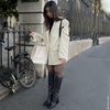 Schwarze Lederstiefel mit hohem Schaft und Blockabsatz