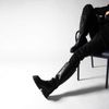 Schwarze Lederstiefel mit hohem Schaft