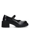 Geschlossene schwarze Plateau-Pumps