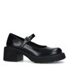 Geschlossene schwarze Plateau-Pumps