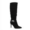 Schwarze Stiefel mit Pfennigabsatz und hohem Schaft