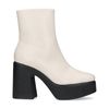 Beigefarbene Stiefeletten mit schwarzem Blockabsatz