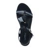 Schwarze Sandalen mit Pom-Poms