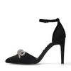 Schwarze Pumps mit silberfarbener Strassschleife